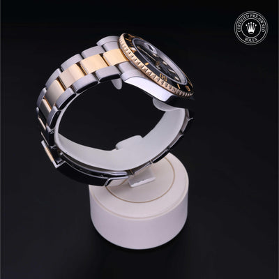 Rolex CPO Submariner M116613LN front on white background
