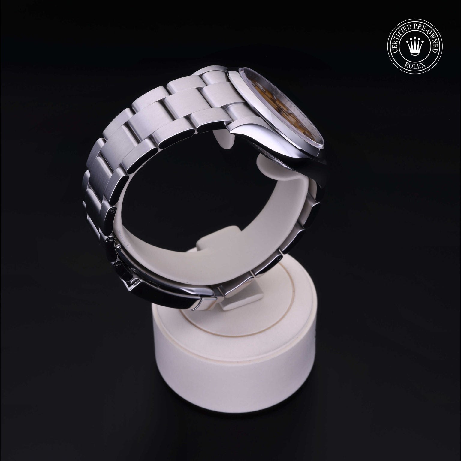 Rolex Certified Pre-owned Oyster Perpetual M126000-0004 front on black background