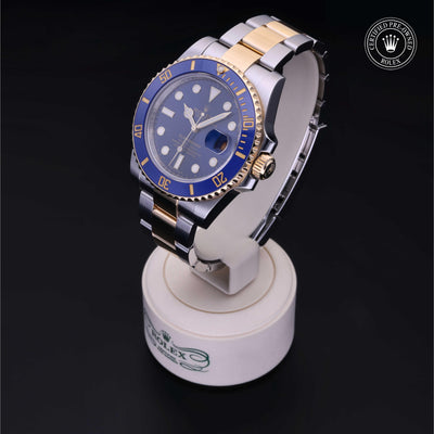 Rolex Certified Pre-owned Submariner M116613LB-0005 front on black background