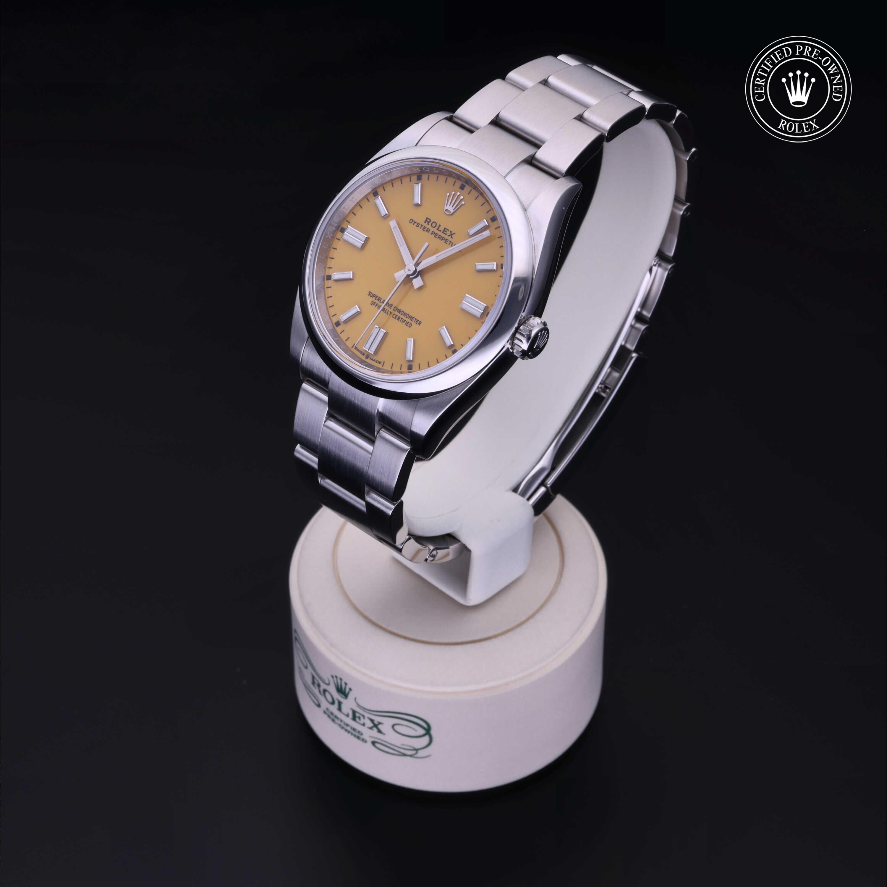 Rolex Certified Pre-owned Oyster Perpetual M126000-0004 front on black background