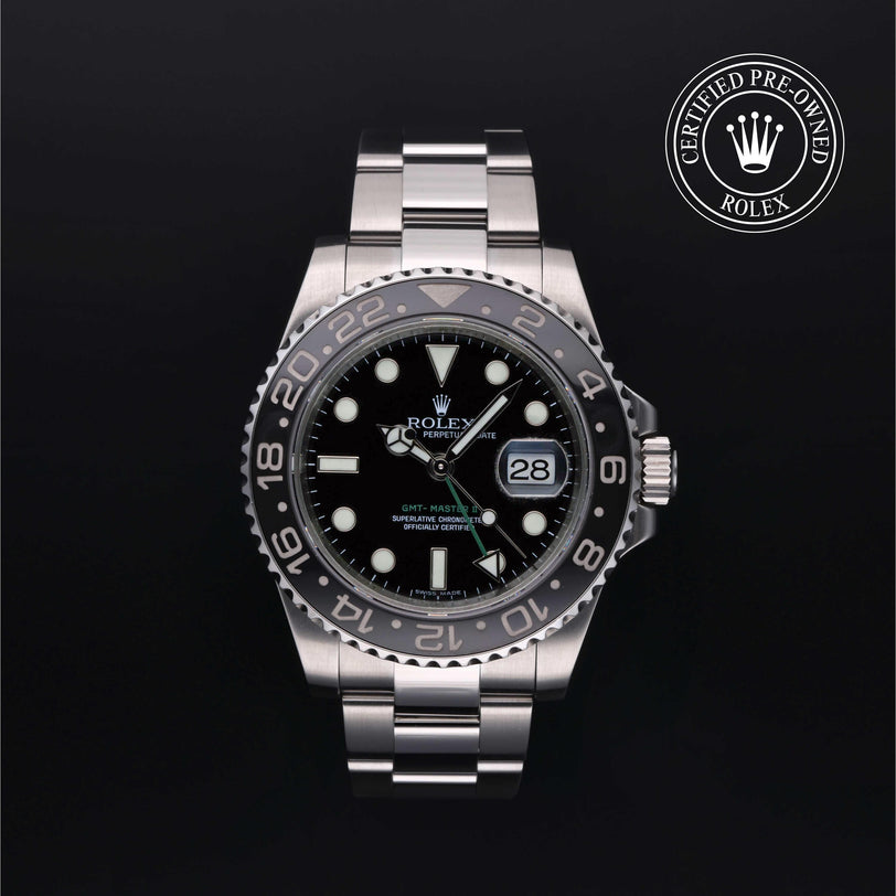 Rolex Certified Pre-owned GMT M116710LN-0001 front on black background