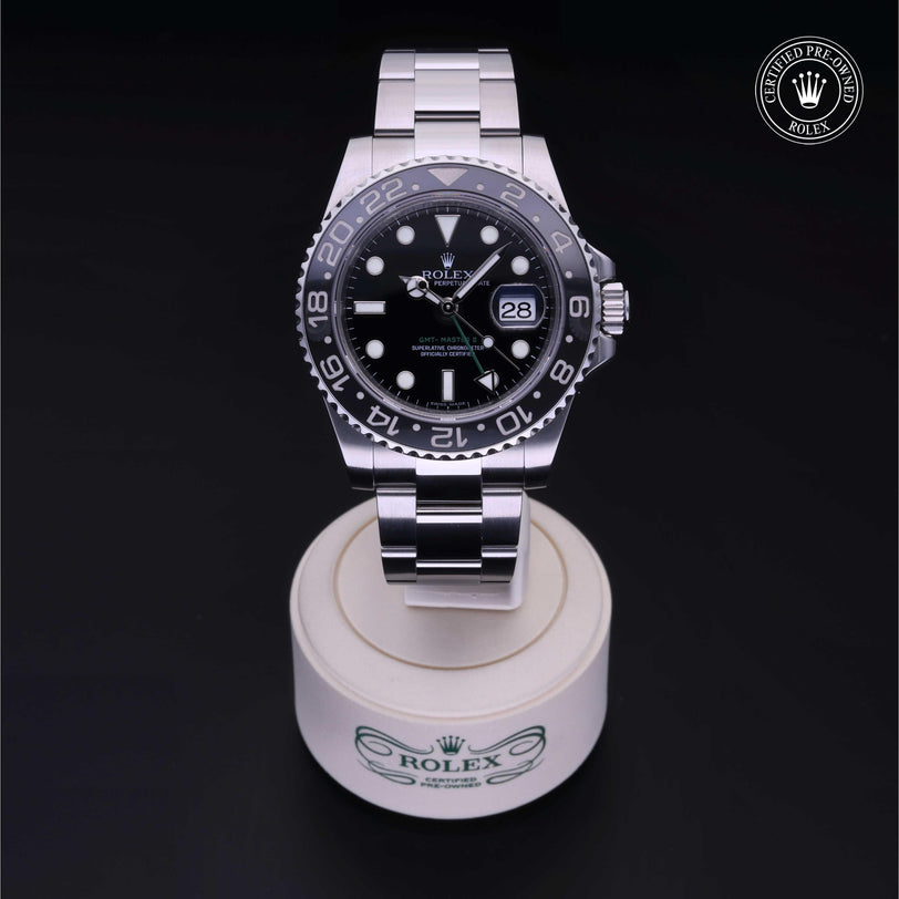 Rolex Certified Pre-owned GMT M116710LN-0001 front on black background