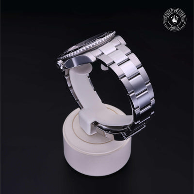 Rolex Certified Pre-owned GMT M116710LN-0001 front on black background
