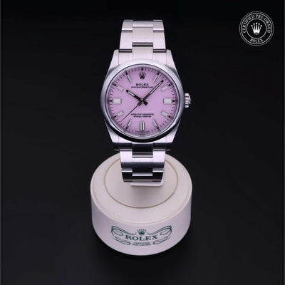 Rolex Certified Pre-owned Oyster Perpetual M126000-0008 front on black background