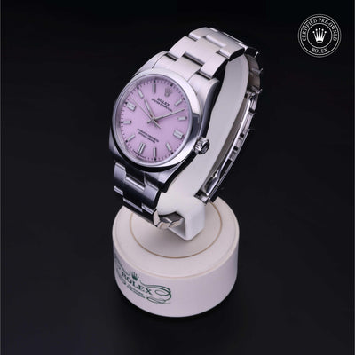 Rolex Certified Pre-owned Oyster Perpetual M126000-0008 front on black background