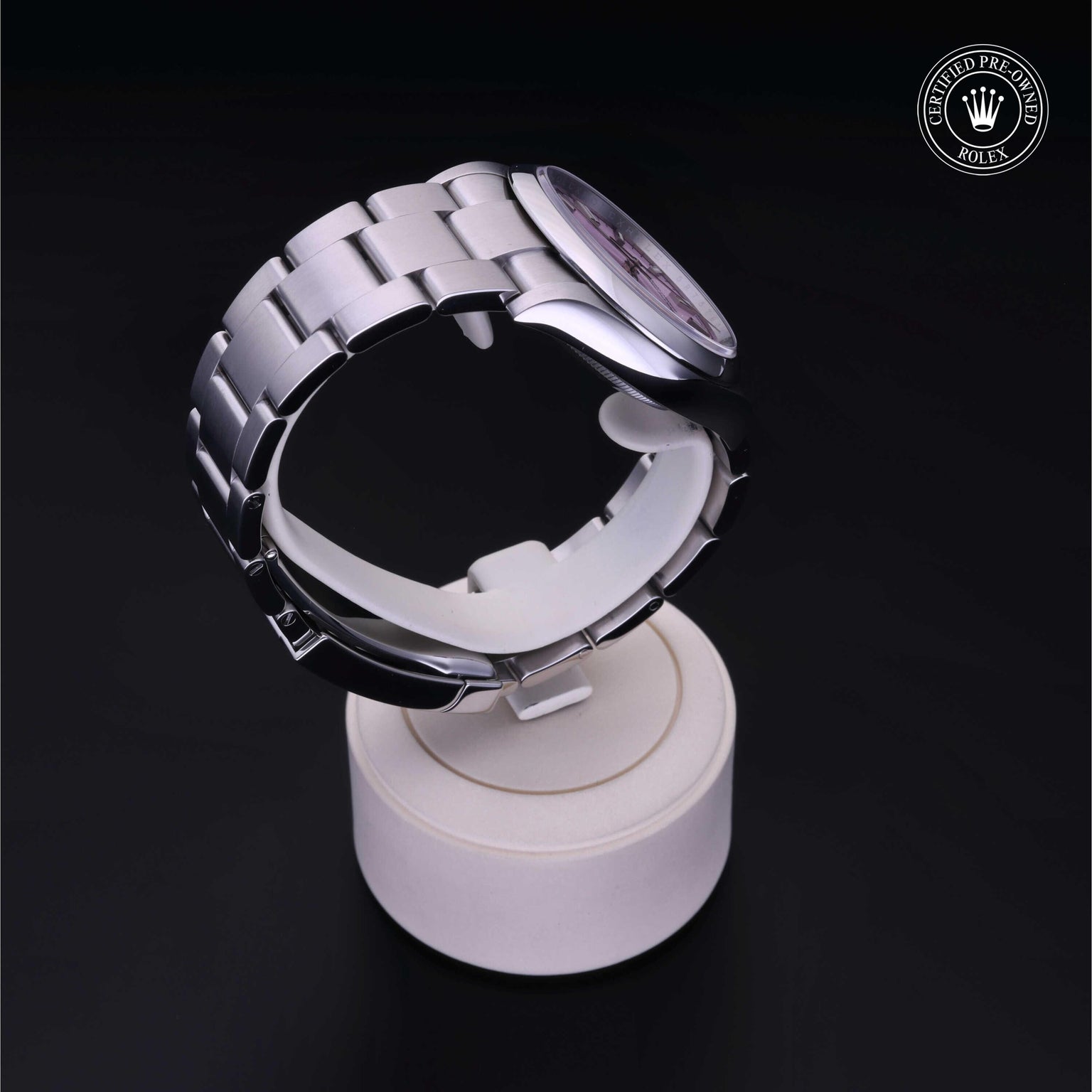 Rolex Certified Pre-owned Oyster Perpetual M126000-0008 front on black background