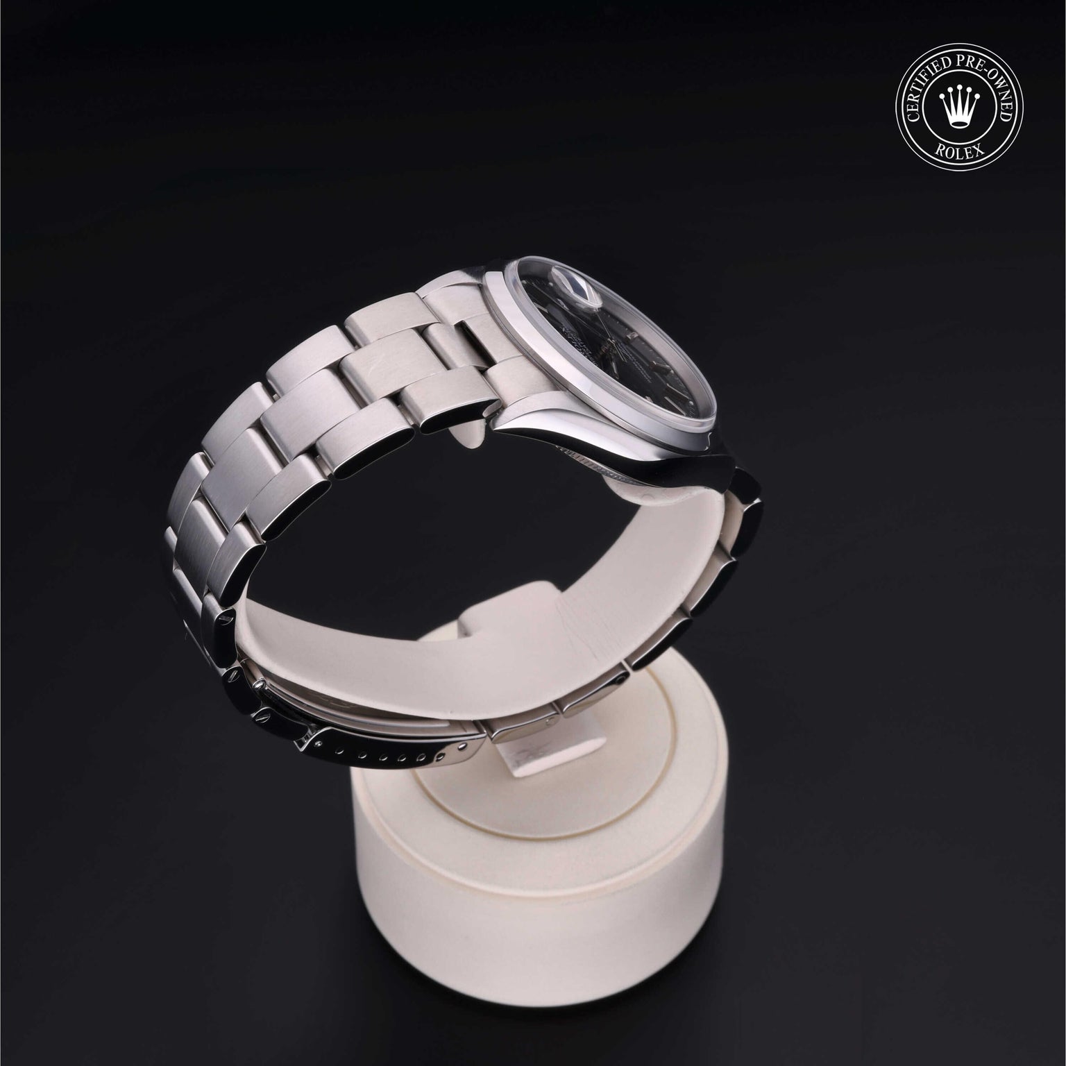 Rolex Certified Pre-owned Oyster Perpetual M15200-0009 front on black background