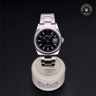 Rolex Certified Pre-owned Datejust M126200-0004 front on black background