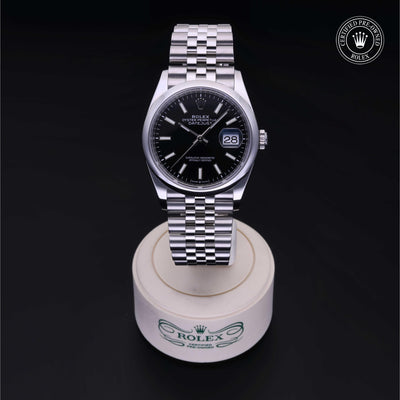 Rolex Certified Pre-owned Datejust M126200-0003 front on black background