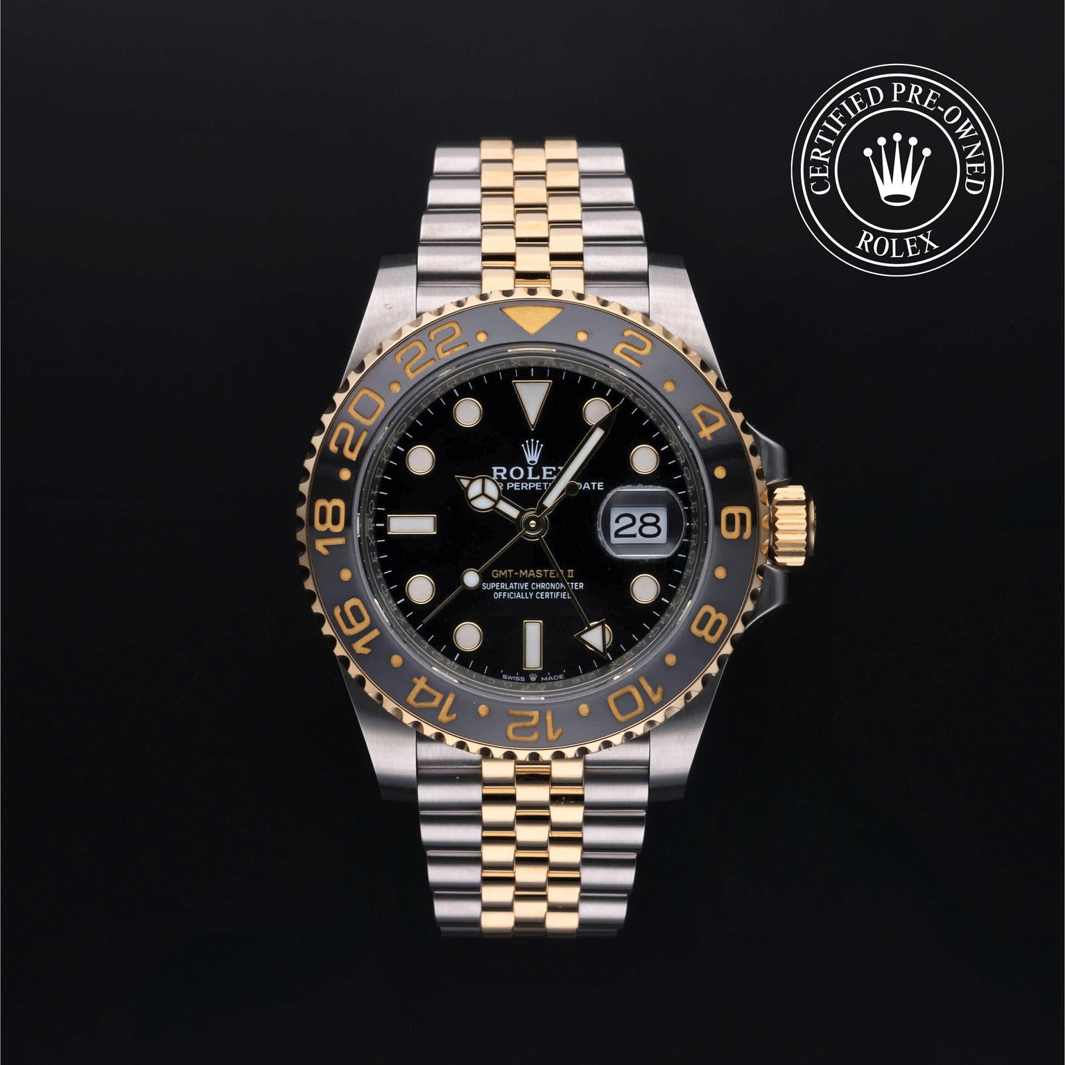 Rolex Certified Pre-owned GMT II M126713GRNR-0001 front on black background