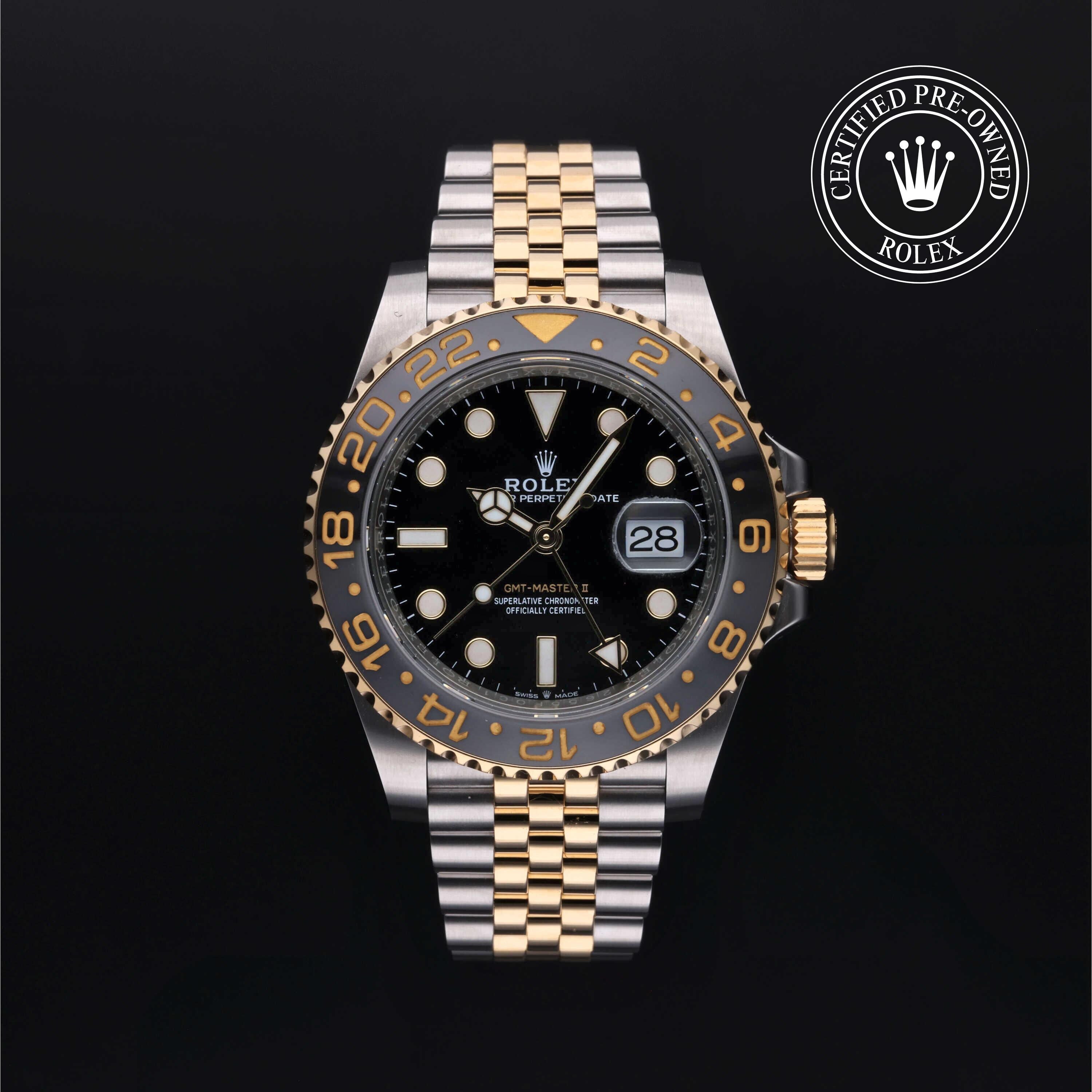 Rolex Certified Pre-owned GMT II M126713GRNR-0001 front on black background