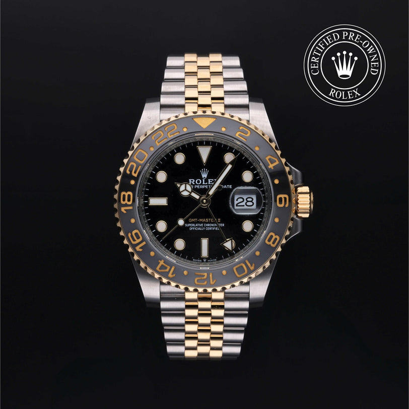 Rolex Certified Pre-owned GMT II M126713GRNR-0001 front on black background