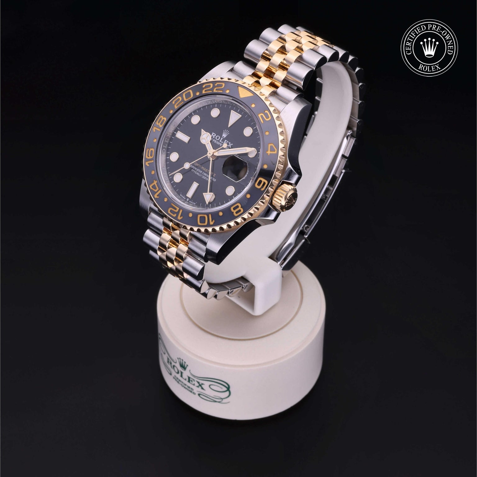 Rolex Certified Pre-owned GMT II M126713GRNR-0001 front on black background