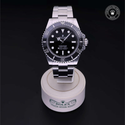 Rolex Certified Pre-owned Submariner M124060-0001 front on black background