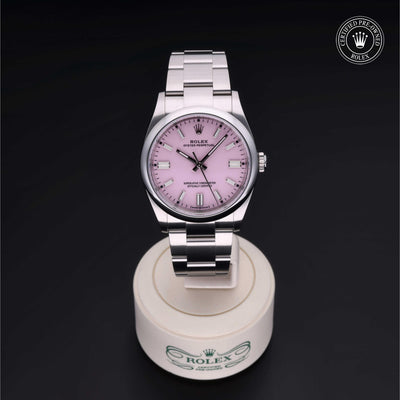 Rolex Certified Pre-owned Oyster Perpetual M126000-0008 front on black background