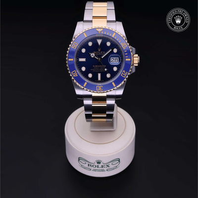 Rolex Certified Pre-owned Submariner M116613LB-0005 front on black background