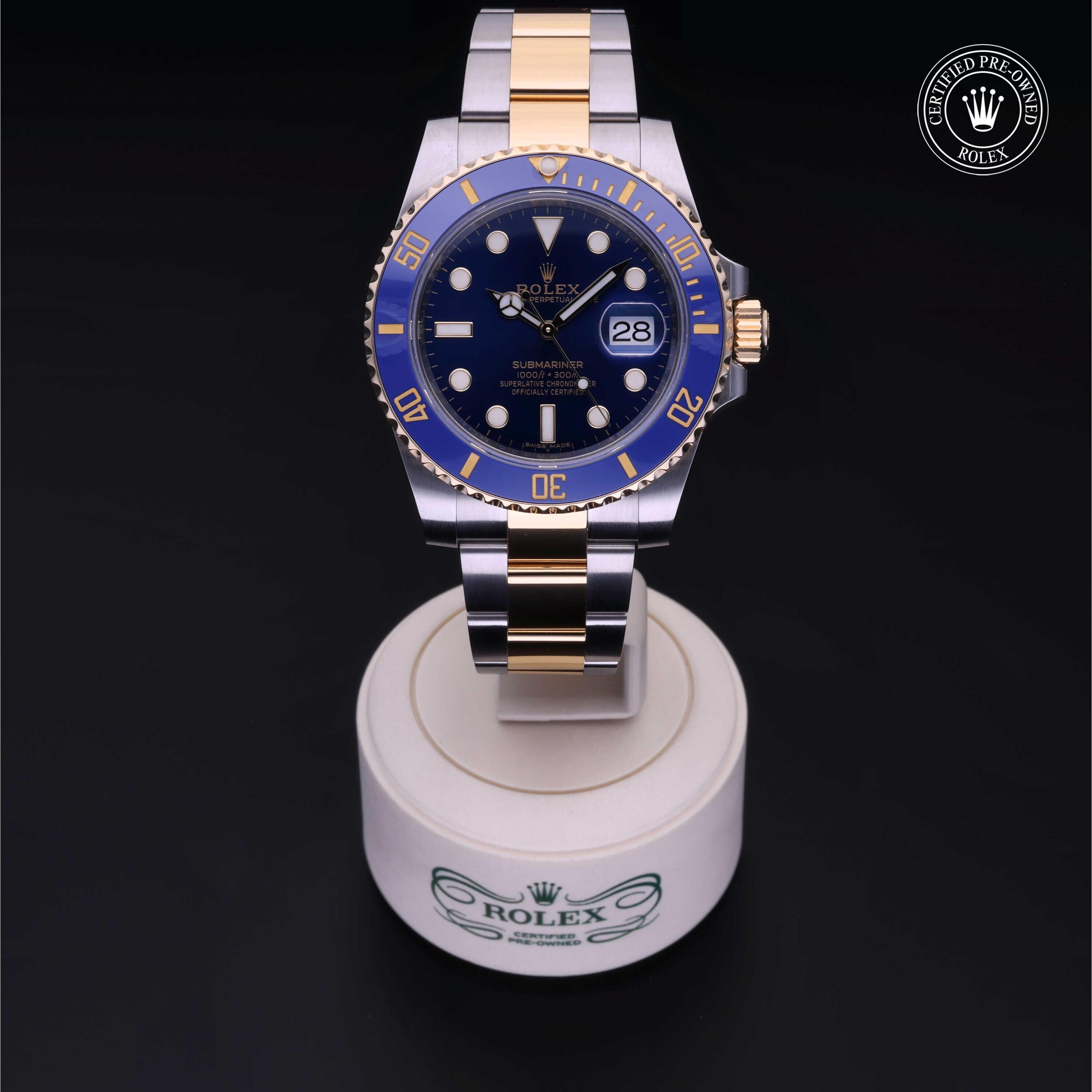 Rolex Certified Pre-owned Submariner M116613LB-0005 front on black background