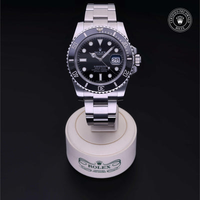 Rolex Certified Pre-owned Submariner M116610LN-0001 front on black background