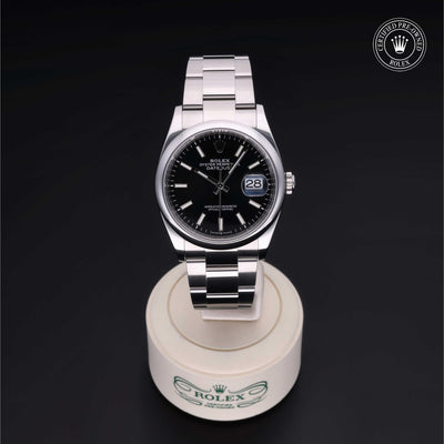 Rolex Certified Pre-owned Datejust M126200-0004 front on black background