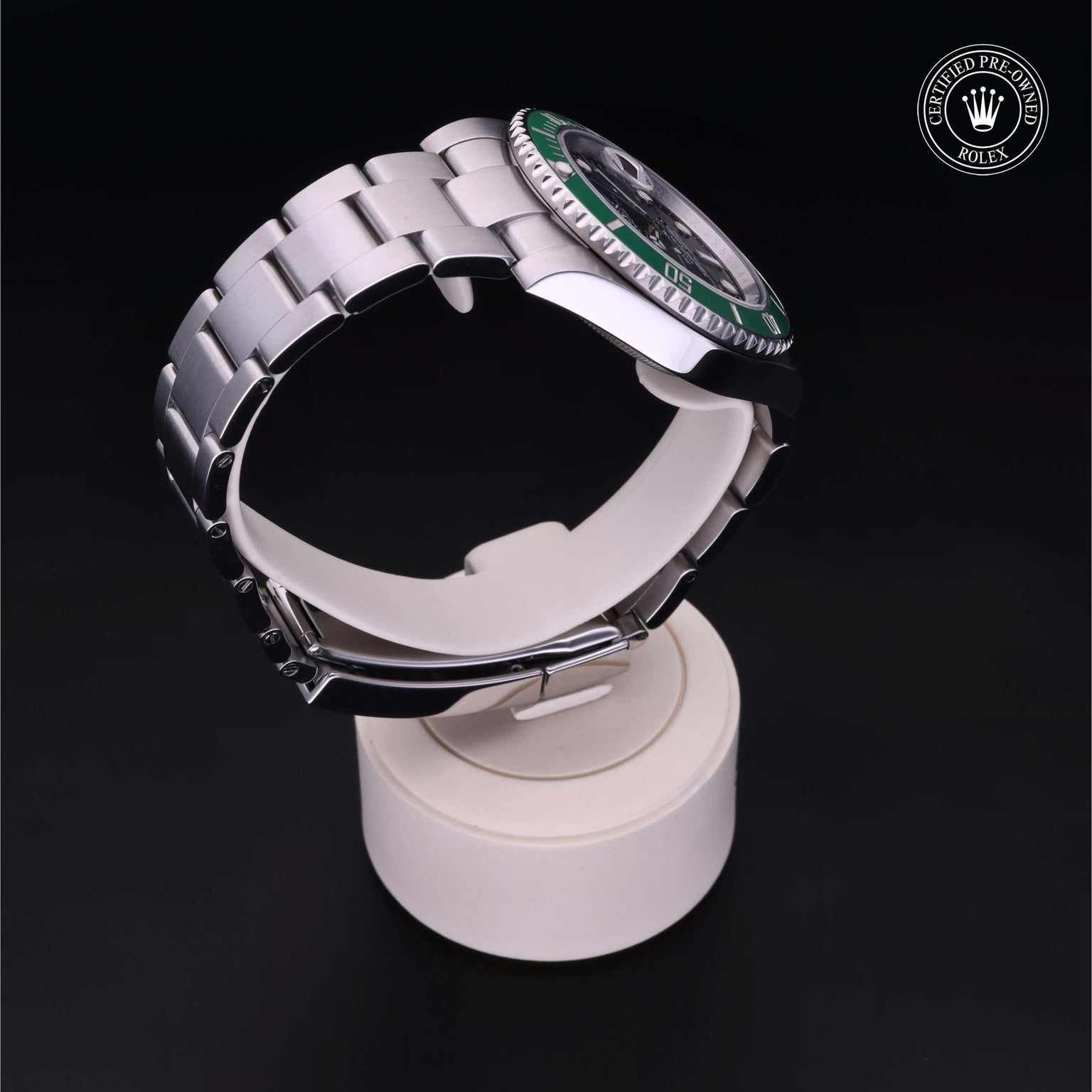 Rolex Certified Pre-owned Submariner M116610LV-0002 front on black background