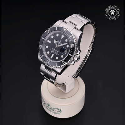 Rolex Certified Pre-owned Submariner M116610LN-0001 front on black background