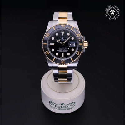 Rolex Certified Pre-owned Submariner M116613LN-0001 front on black background