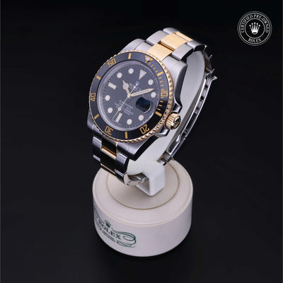 Rolex Certified Pre-owned Submariner M116613LN-0001 front on black background