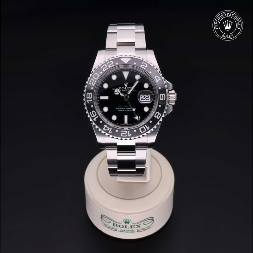 Rolex Certified Pre-owned GMT M116710LN-0001 front on black background