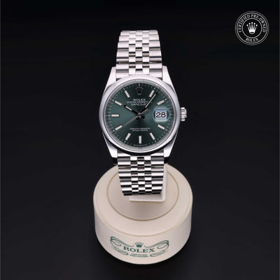 Rolex Certified Pre-owned Datejust M126200-0023 front on black background