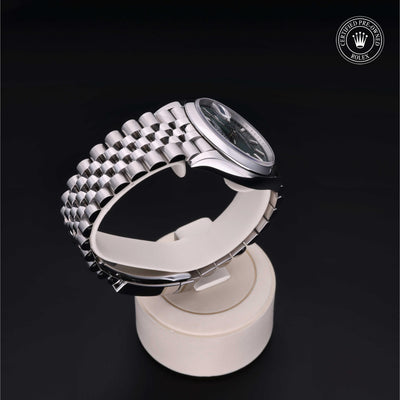 Rolex Certified Pre-owned Datejust M126200-0023 front on black background
