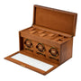 Tan leather case with three circular watch winders and storage compartments, front drawer open showing white interior.