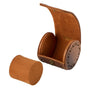 Tan leather watch roll with perforated circular base and removable cylindrical compartment, shown open and closed.
