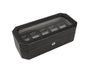 Black watch box with glass top displaying five cushioned compartments and silver lock.