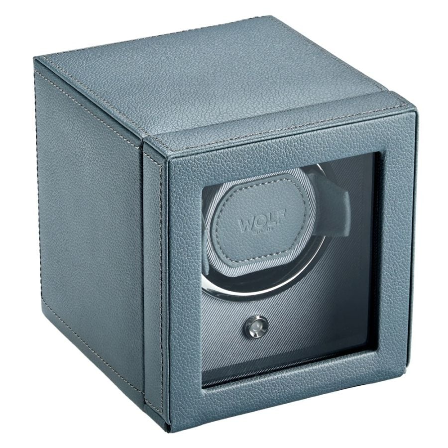 Blue-gray leather watch winder with transparent front window displaying single watch slot and Wolf branding.