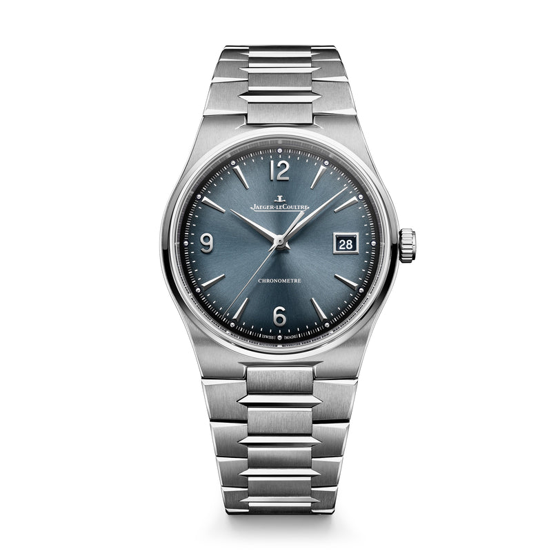 Stainless steel watch with blue dial, date window, Arabic numerals, and matching metal bracelet.