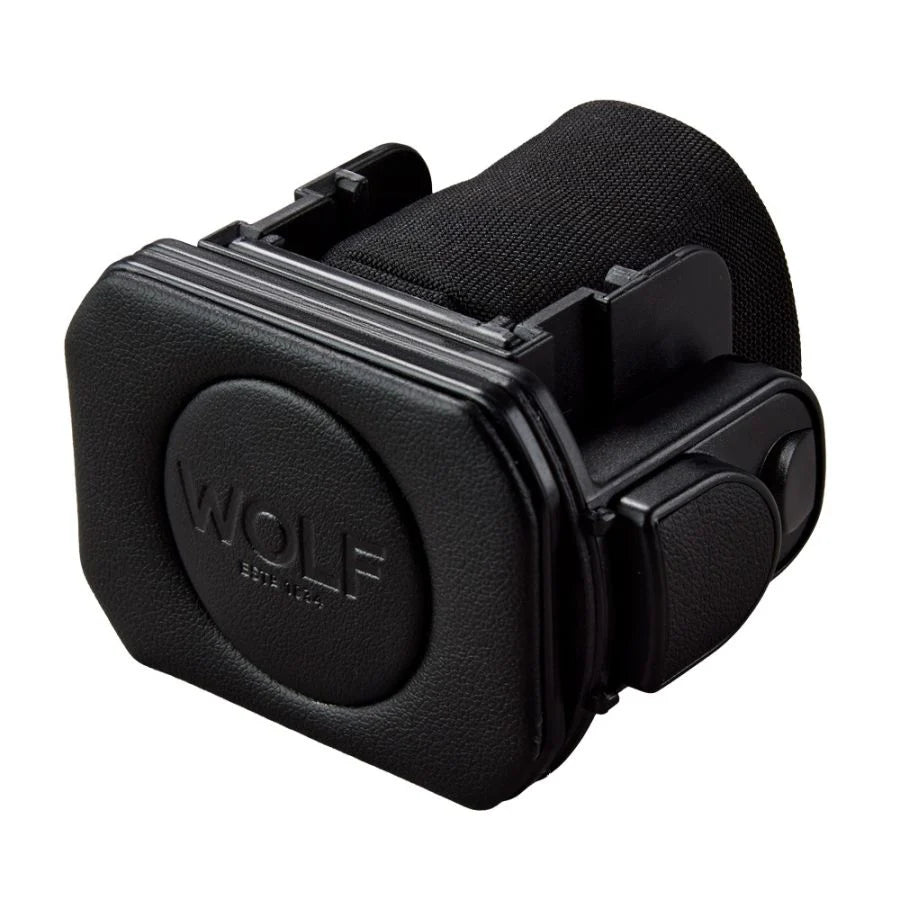 Black virtual reality headset with textured front panel, side controls, and adjustable head strap.