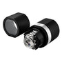 Black cylindrical watch case with white band stripe, showing chronograph watch with metal bracelet inside and separate cap.