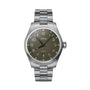 Silver Oris watch with a dark green dial on a gradient background