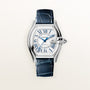 Cartier stainless steel watch with white dial, blue Roman numerals, date window, and dark blue leather strap.