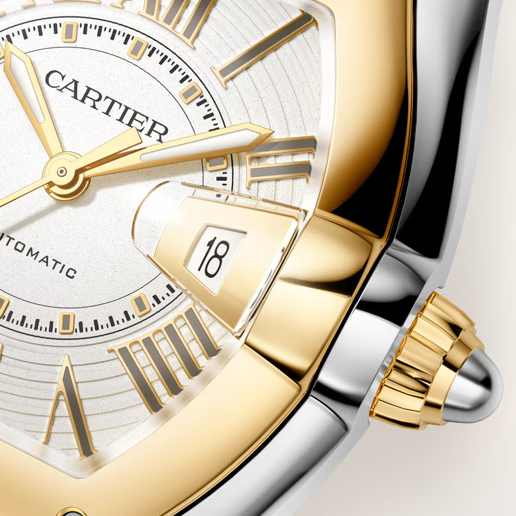 Cartier Roadster watch with two-tone gold and silver case, white dial, gold hands, and date window displaying 18.