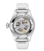 Stainless steel pilot watch with visible mechanical movement, white rubber strap, and exposed skeleton dial with golden rotor