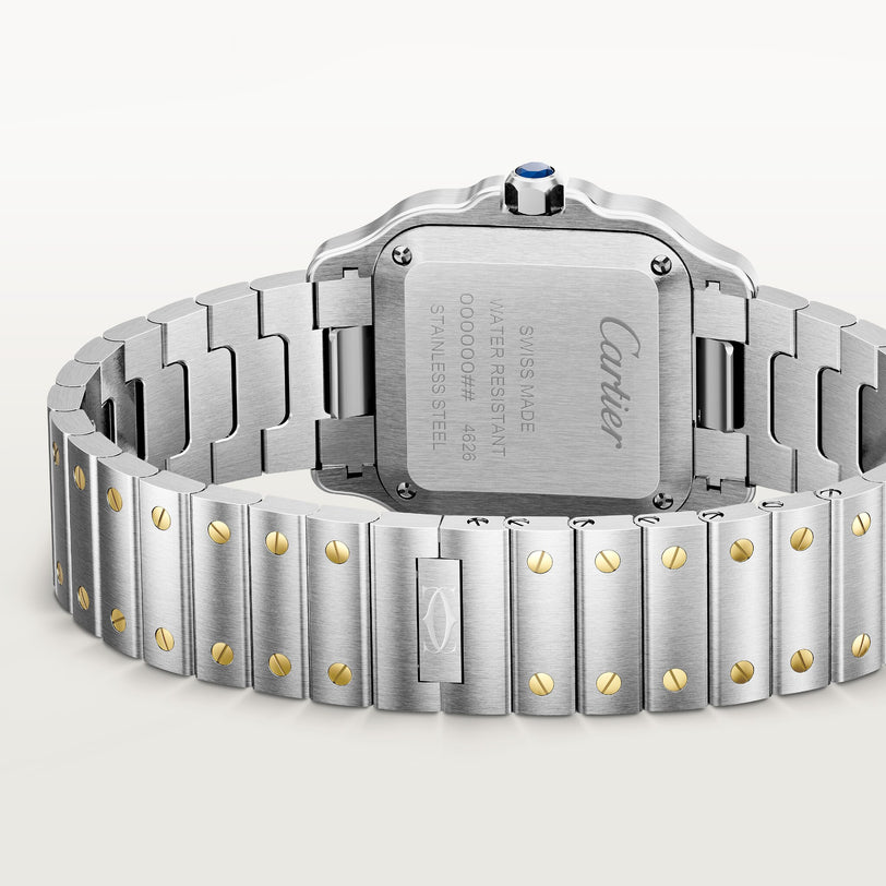 A close-up of the Santos De Cartier Watch by Cartier shows its stainless steel back and bracelet with gold screw accents.