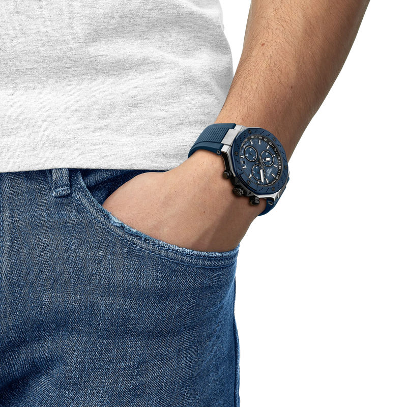 Person wearing a blue watch on a white background