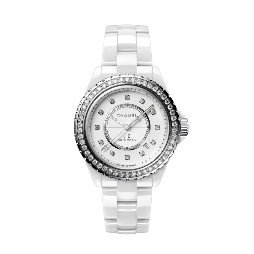 The Chanel J12 Diamond Bezel is an automatic white wristwatch featuring a highly resistant ceramic bracelet, diamond-studded bezel, and diamond hour markers on a white dial, displayed against a plain white background.