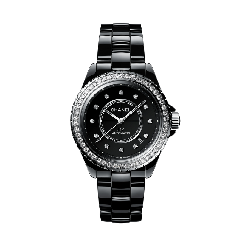 The Chanel J12 Diamond Bezel watch features a round black ceramic and steel case, diamond-set bezel, diamond hour markers, silver hands, and a black bracelet-style band for a luxurious automatic timepiece.