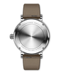 Silver stainless steel watch with brushed dial, taupe leather strap, and engraved case back showing "Portofino Day & Night" t