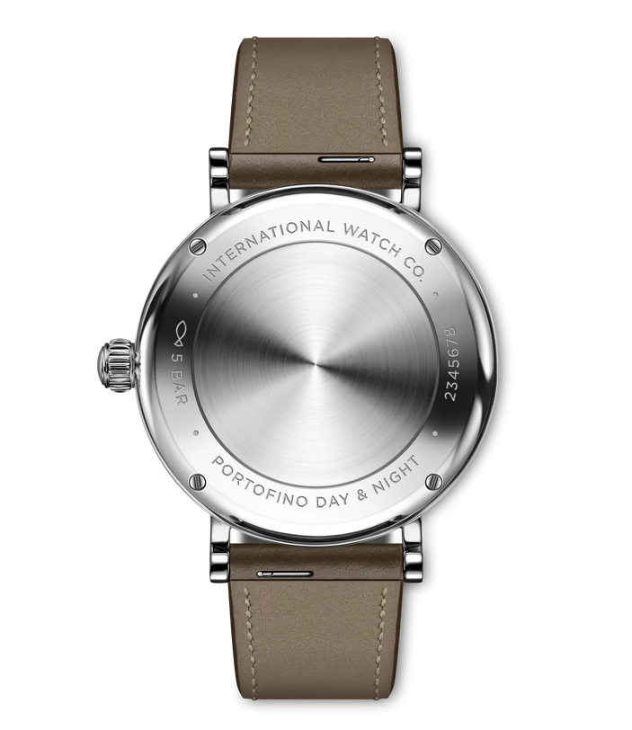 Silver stainless steel watch with brushed dial, taupe leather strap, and engraved case back showing "Portofino Day & Night" t