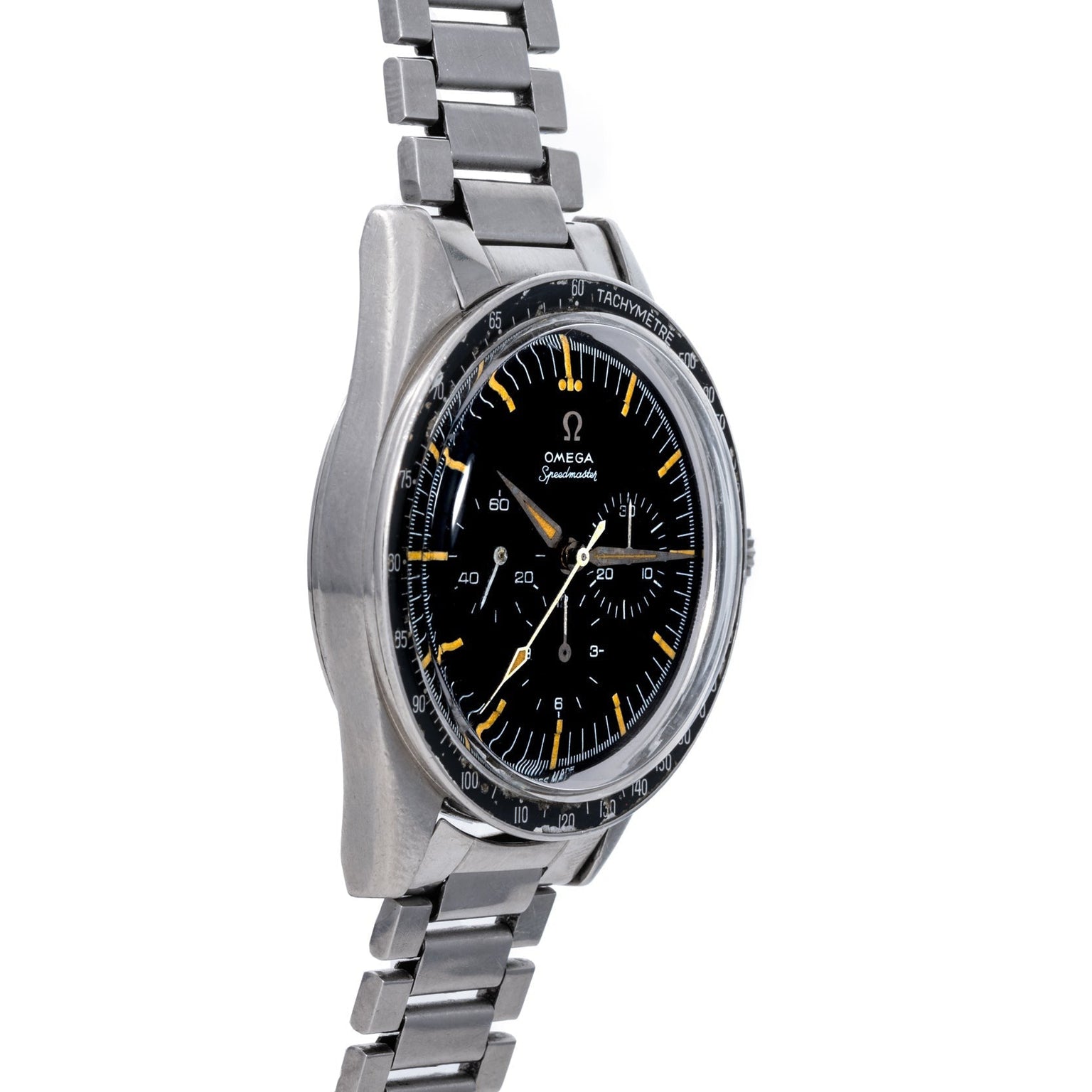 An OMEGA Speedmaster watch featuring a stainless steel case, black dial, and metal link bracelet is displayed at an angle.