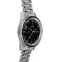 An OMEGA Speedmaster watch featuring a stainless steel case, black dial, and metal link bracelet is displayed at an angle.