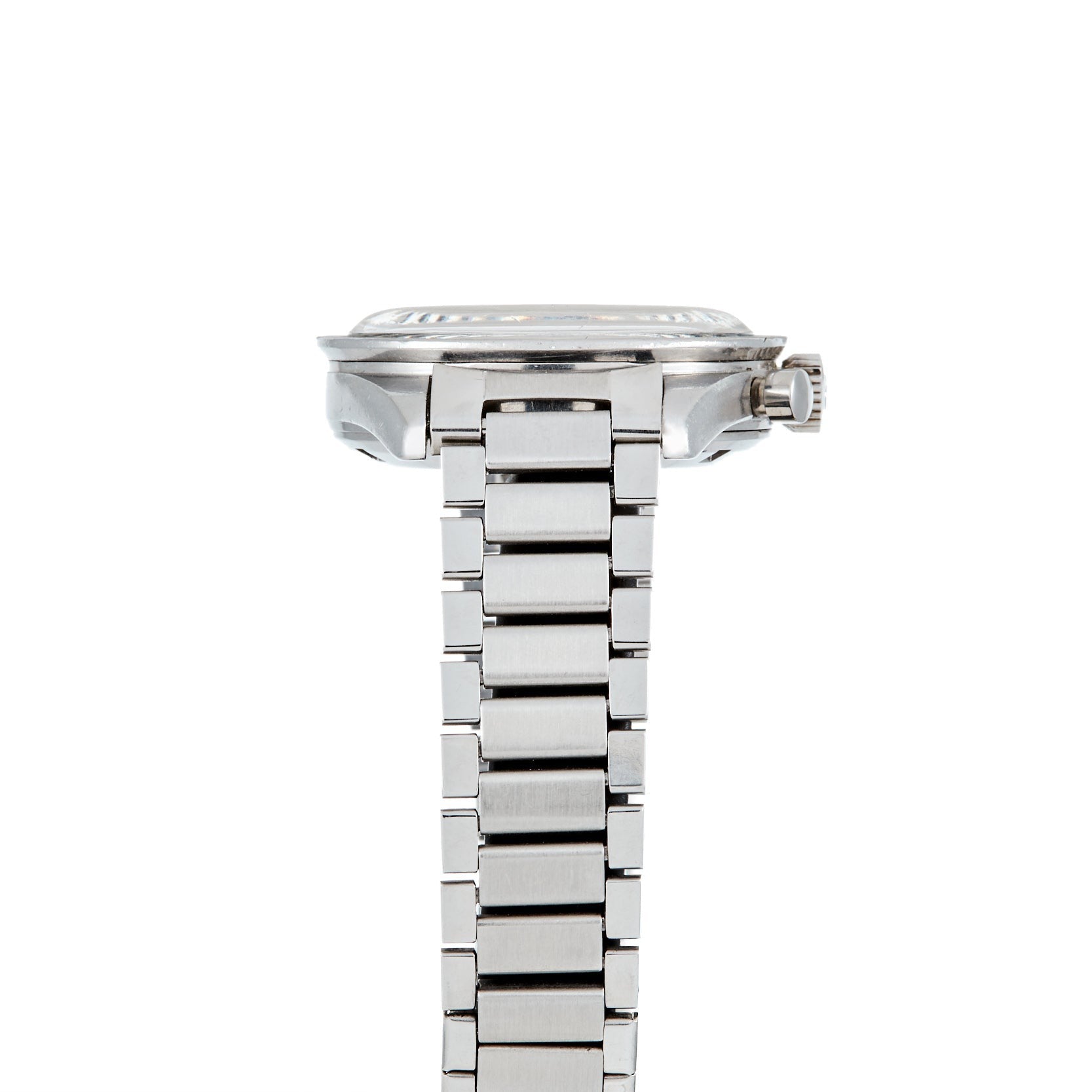 Side view of the Watches of Switzerland Speedmaster Ed White, a silver metal wristwatch with a linked band, showing the crown and part of the face.